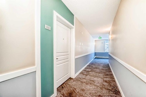 203-48 Panatella Road Nw, Calgary, AB - Indoor Photo Showing Other Room