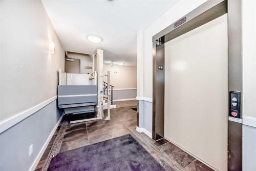 203-48 Panatella Road Nw, Calgary, AB - Indoor Photo Showing Other Room