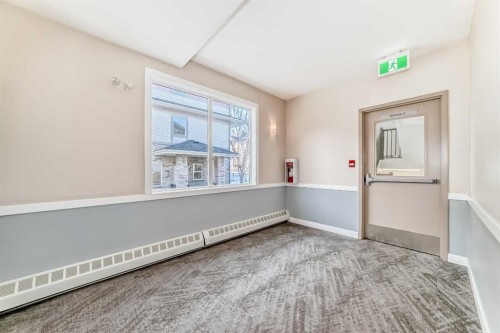203-48 Panatella Road Nw, Calgary, AB - Indoor Photo Showing Other Room
