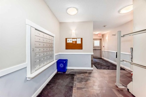 203-48 Panatella Road Nw, Calgary, AB - Indoor Photo Showing Other Room