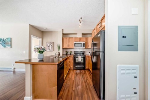 203-48 Panatella Road Nw, Calgary, AB - Indoor Photo Showing Kitchen