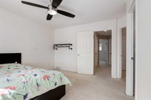 15770 Everstone Road Sw, Calgary, AB - Indoor Photo Showing Bedroom