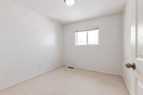 15770 Everstone Road Sw, Calgary, AB - Indoor Photo Showing Other Room