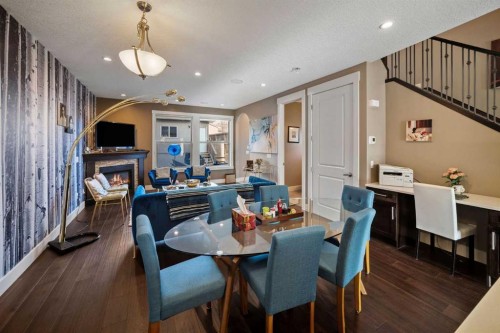 4410 17 Avenue Nw, Calgary, AB - Indoor Photo Showing Dining Room With Fireplace