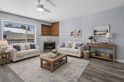 3103 39 Street Sw, Calgary, AB - Indoor Photo Showing Living Room With Fireplace