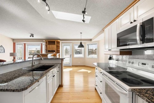 8 Edgevalley View Nw, Calgary, AB - Indoor Photo Showing Kitchen With Double Sink