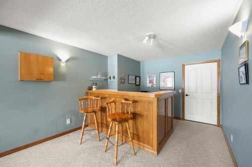 8 Edgevalley View Nw, Calgary, AB - Indoor Photo Showing Other Room