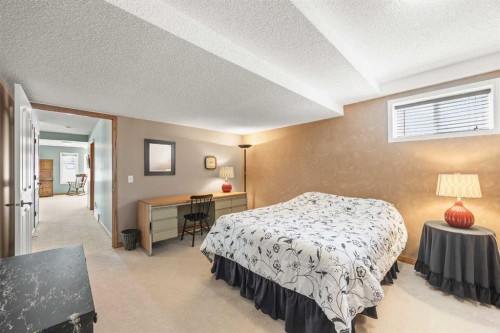 8 Edgevalley View Nw, Calgary, AB - Indoor Photo Showing Bedroom