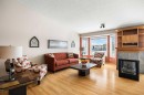 8 Edgevalley View Nw, Calgary, AB  - Indoor Photo Showing Living Room With Fireplace 