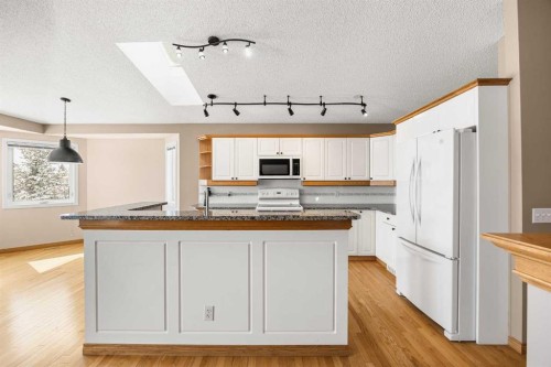 8 Edgevalley View Nw, Calgary, AB - Indoor Photo Showing Kitchen With Double Sink
