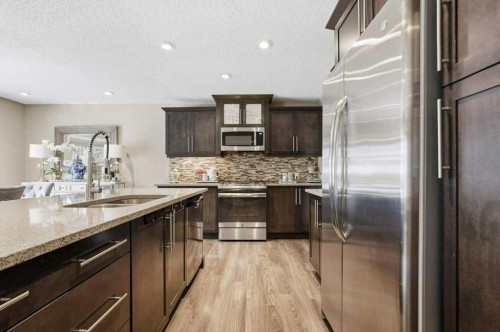 148 Viewpointe Terrace, Chestermere, AB - Indoor Photo Showing Kitchen With Double Sink With Upgraded Kitchen