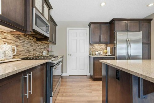 148 Viewpointe Terrace, Chestermere, AB - Indoor Photo Showing Kitchen With Upgraded Kitchen