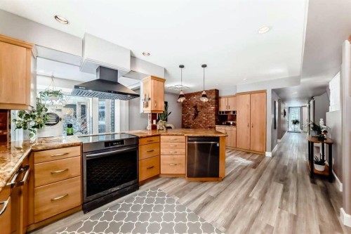 2002 Pump Hill Way Sw, Calgary, AB - Indoor Photo Showing Kitchen With Upgraded Kitchen
