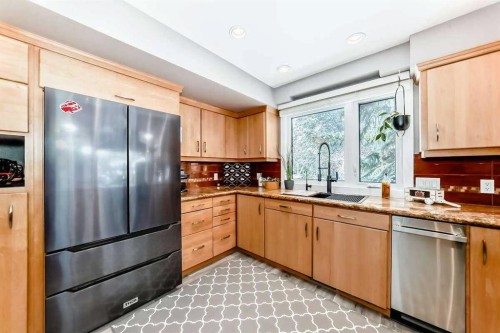 2002 Pump Hill Way Sw, Calgary, AB - Indoor Photo Showing Kitchen With Stainless Steel Kitchen With Double Sink