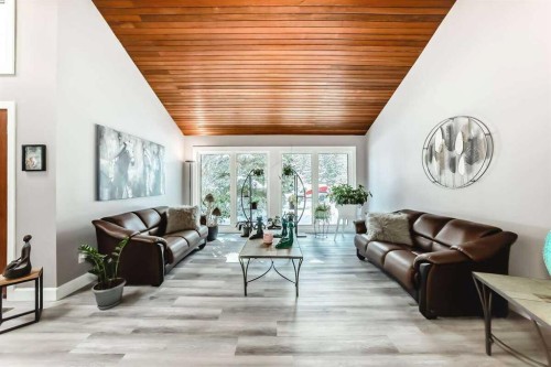 2002 Pump Hill Way Sw, Calgary, AB - Indoor Photo Showing Living Room