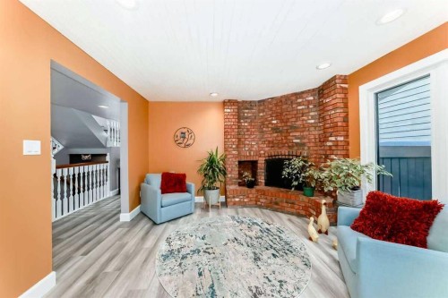 2002 Pump Hill Way Sw, Calgary, AB - Indoor With Fireplace
