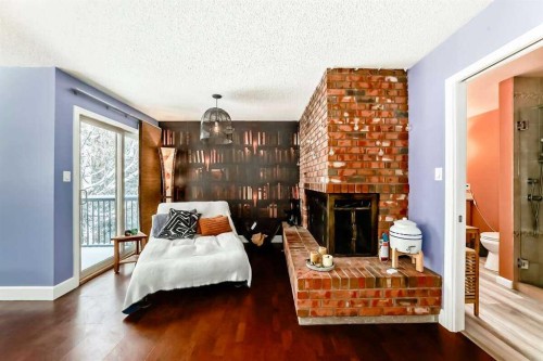 2002 Pump Hill Way Sw, Calgary, AB - Indoor With Fireplace