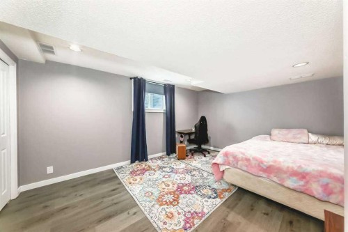 2002 Pump Hill Way Sw, Calgary, AB - Indoor Photo Showing Bedroom