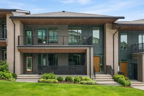 615 Sovereign Common Sw, Calgary, AB - Outdoor With Balcony With Facade