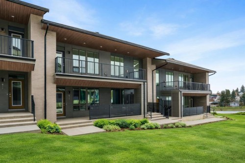615 Sovereign Common Sw, Calgary, AB - Outdoor With Balcony With Facade
