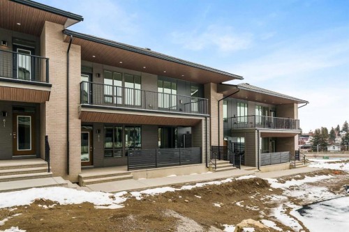 615 Sovereign Common Sw, Calgary, AB - Outdoor With Balcony With Facade