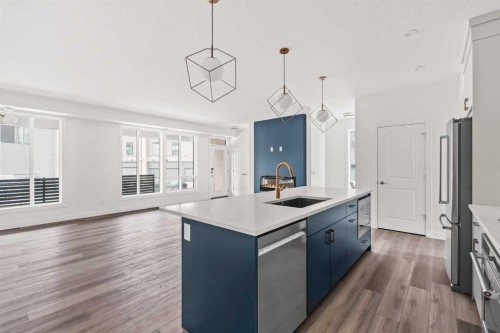 605 Sovereign Common Sw, Calgary, AB - Indoor Photo Showing Kitchen With Upgraded Kitchen