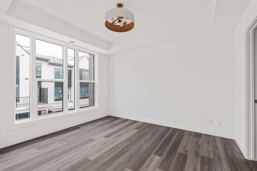 605 Sovereign Common Sw, Calgary, AB - Indoor Photo Showing Other Room
