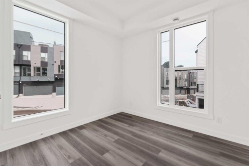 605 Sovereign Common Sw, Calgary, AB - Indoor Photo Showing Other Room