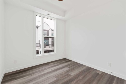 605 Sovereign Common Sw, Calgary, AB - Indoor Photo Showing Other Room