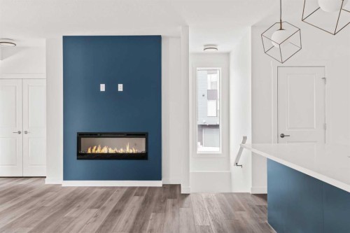 605 Sovereign Common Sw, Calgary, AB - Indoor With Fireplace
