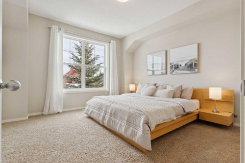 63 Walden Drive Se, Calgary, AB - Indoor Photo Showing Bedroom
