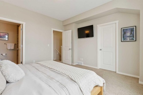 63 Walden Drive Se, Calgary, AB - Indoor Photo Showing Bedroom