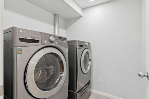 63 Walden Drive Se, Calgary, AB - Indoor Photo Showing Laundry Room