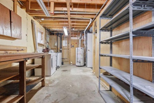 32 Fonda Mews Se, Calgary, AB - Indoor Photo Showing Basement