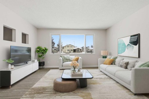 32 Fonda Mews Se, Calgary, AB - Indoor Photo Showing Living Room