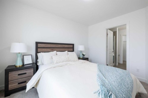 48 Andalusian Road, Cochrane, AB - Indoor Photo Showing Bedroom