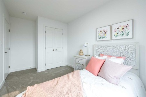 48 Andalusian Road, Cochrane, AB - Indoor Photo Showing Bedroom