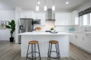48 Andalusian Road, Cochrane, AB  - Indoor Photo Showing Kitchen With Upgraded Kitchen 