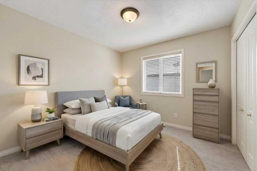 137 Simcrest Heights Sw, Calgary, AB - Indoor Photo Showing Bedroom