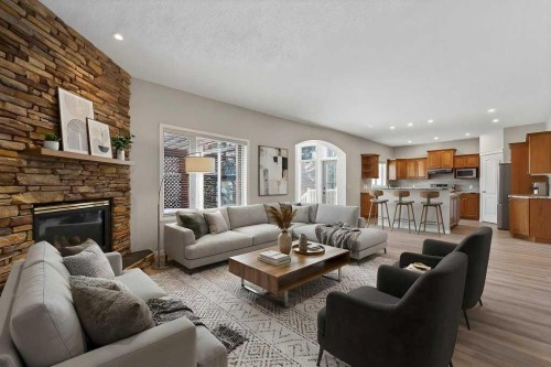 137 Simcrest Heights Sw, Calgary, AB - Indoor Photo Showing Living Room With Fireplace