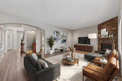 137 Simcrest Heights Sw, Calgary, AB - Indoor Photo Showing Living Room With Fireplace