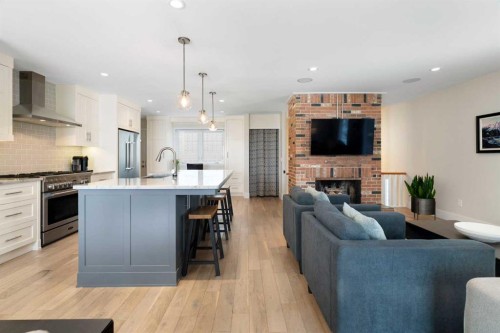 6607 Silver Springs Crescent Nw, Calgary, AB - Indoor Photo Showing Kitchen With Fireplace With Upgraded Kitchen