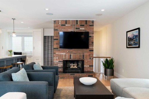 6607 Silver Springs Crescent Nw, Calgary, AB - Indoor Photo Showing Living Room With Fireplace