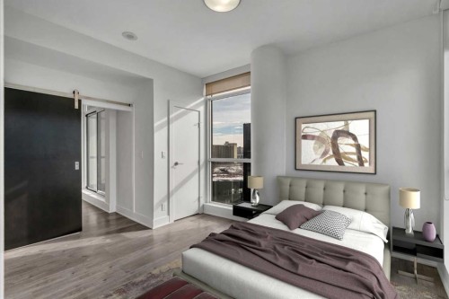 1003-550 Riverfront Avenue Se, Calgary, AB - Indoor Photo Showing Bedroom