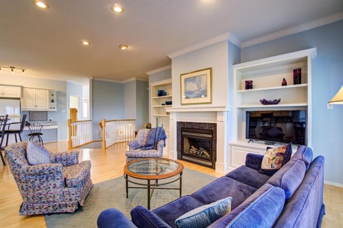 8 Link Spur, Claresholm, AB - Indoor Photo Showing Living Room With Fireplace