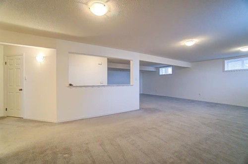 8 Link Spur, Claresholm, AB - Indoor Photo Showing Basement
