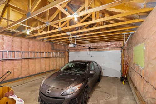 184 Sunmeadows Crescent Se, Calgary, AB - Indoor Photo Showing Garage