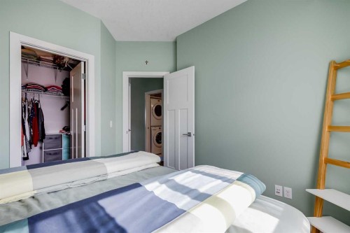 132 Evanscrest Gardens Nw, Calgary, AB - Indoor Photo Showing Bedroom