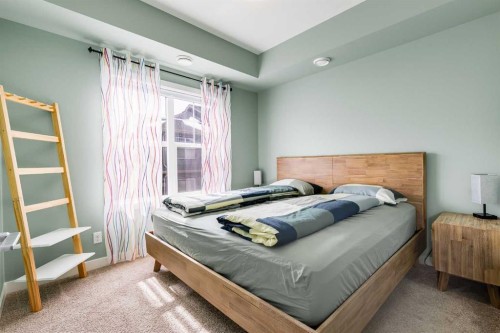 132 Evanscrest Gardens Nw, Calgary, AB - Indoor Photo Showing Bedroom