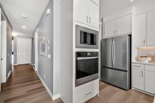 207 Huxland Path Ne, Calgary, AB - Indoor Photo Showing Kitchen